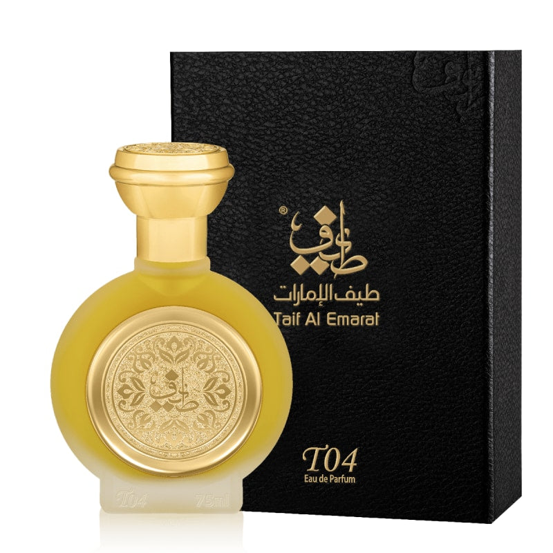 Gold perfume bottle with intricate design next to a black box labeled 'Taif Al Emarat' on a white background. It is a T04 EDP 75mL spray from Taif Al Emarat.