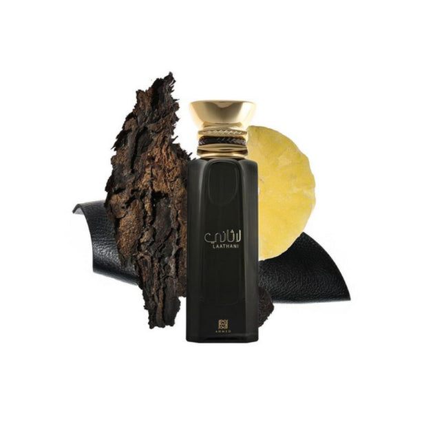Laathani EDP 80mL by Ahmed Al Maghribi. Oud , Leather and Citrus can be seen in the white background