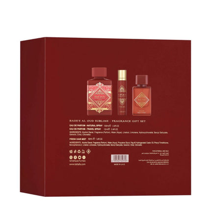 Red gift box with Badee Al Oud perfume bottles on a white background. It is the Lattafa Gift Set – Badee Al Oud Sublime: Lattafa Sublime 3-in-1 Gift Set | Includes 100ml EDP, 12ml EDP, and Hair Mist
