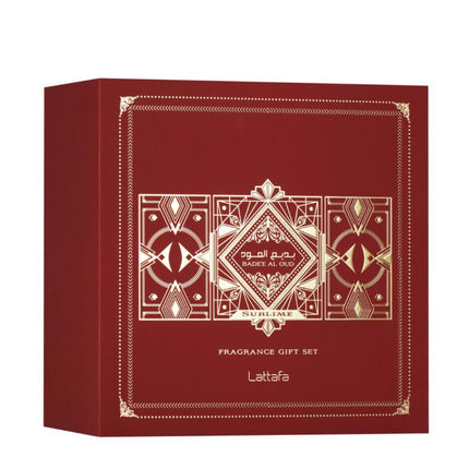 Red fragrance gift set box with intricate design and 'Lattafa' branding on a white background. It is the Lattafa Gift Set – Badee Al Oud Sublime: Lattafa Sublime 3-in-1 Gift Set | Includes 100ml EDP, 12ml EDP, and Hair Mist