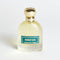 Perfume bottle labeled 'Midnight Glow Emirates Pride' with a gold cap on a white background. It is a EDP 100mL Spray.