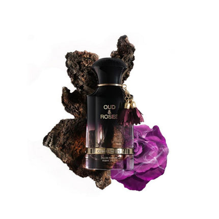 Oud Roses EDP 60mL by Ahmed Al Maghribi. Oud Wood and Rose can be seen in the background 