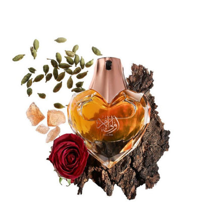 Oulil Amr EDP 60mL by Ahmed Al Maghribi. Cardamom, Rose, Oud and Amber can be seen in the white background.