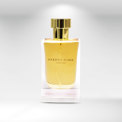Perfume bottle with gold cap and label on a white background