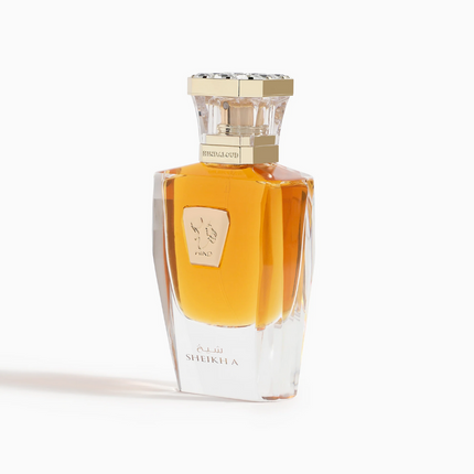 Perfume bottle with gold cap on a white background. It is Sheikh A Parfum 50mL by Hind Al Oud