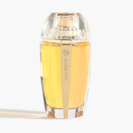 Perfume bottle with 'Sukar' branding on a white background