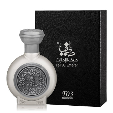 White perfume bottle with intricate design and black box labeled 'Taif Al Emarat' on a white background. It is Taif Al Emarat's T03 EDP 75mL