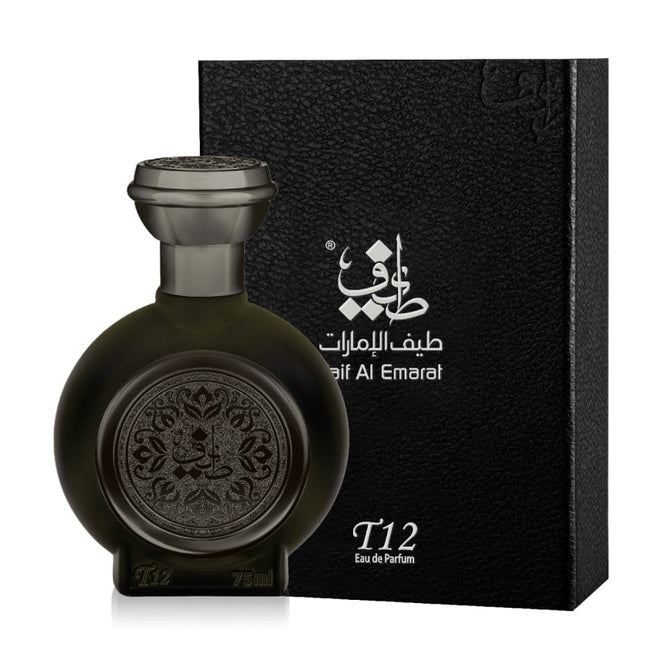 Black perfume bottle with intricate design next to a black box featuring 'Taif Al Emarat' branding on a white background.