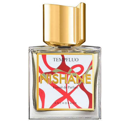 Perfume bottle with gold cap and colorful label on a white background